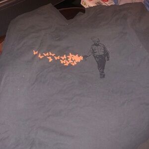 Obey: Protesters Get Tear Gassed with Butterflies from the Happy Opressors